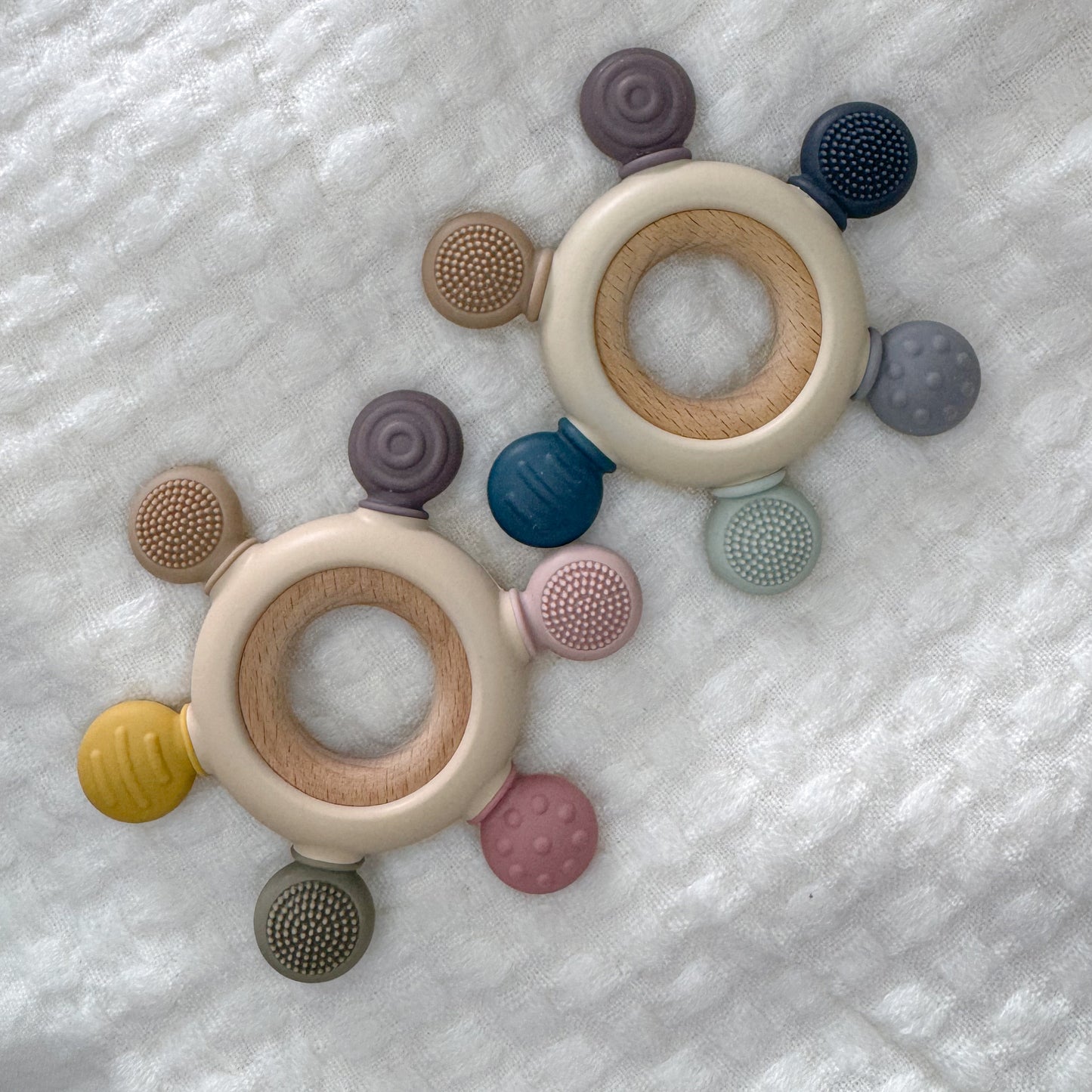 Textured baby teether toys made of silicone and beechwood