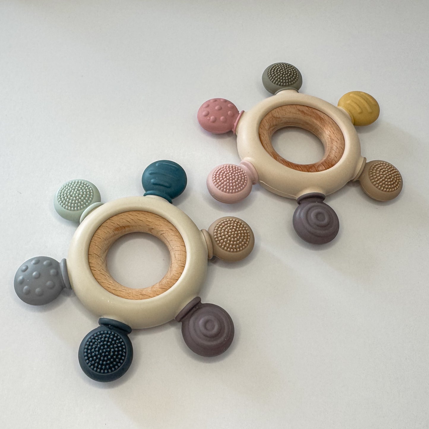 Textured baby teether toys made of silicone and beechwood