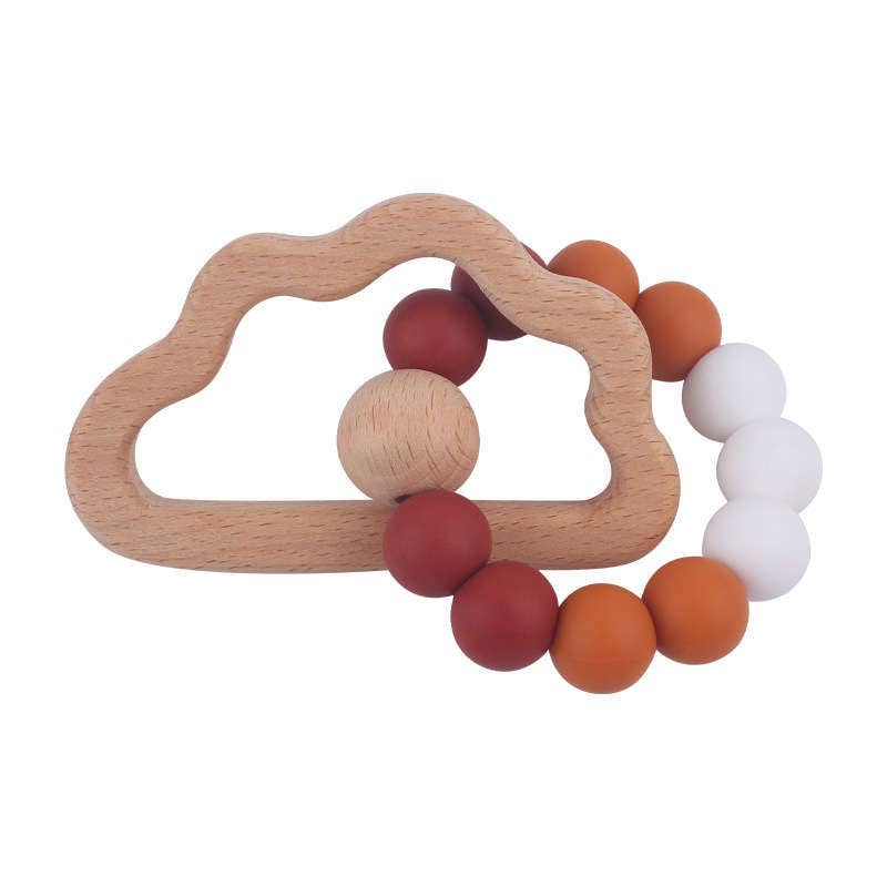 rust, orange, and white multicolored silicone teether with beechwood cloud